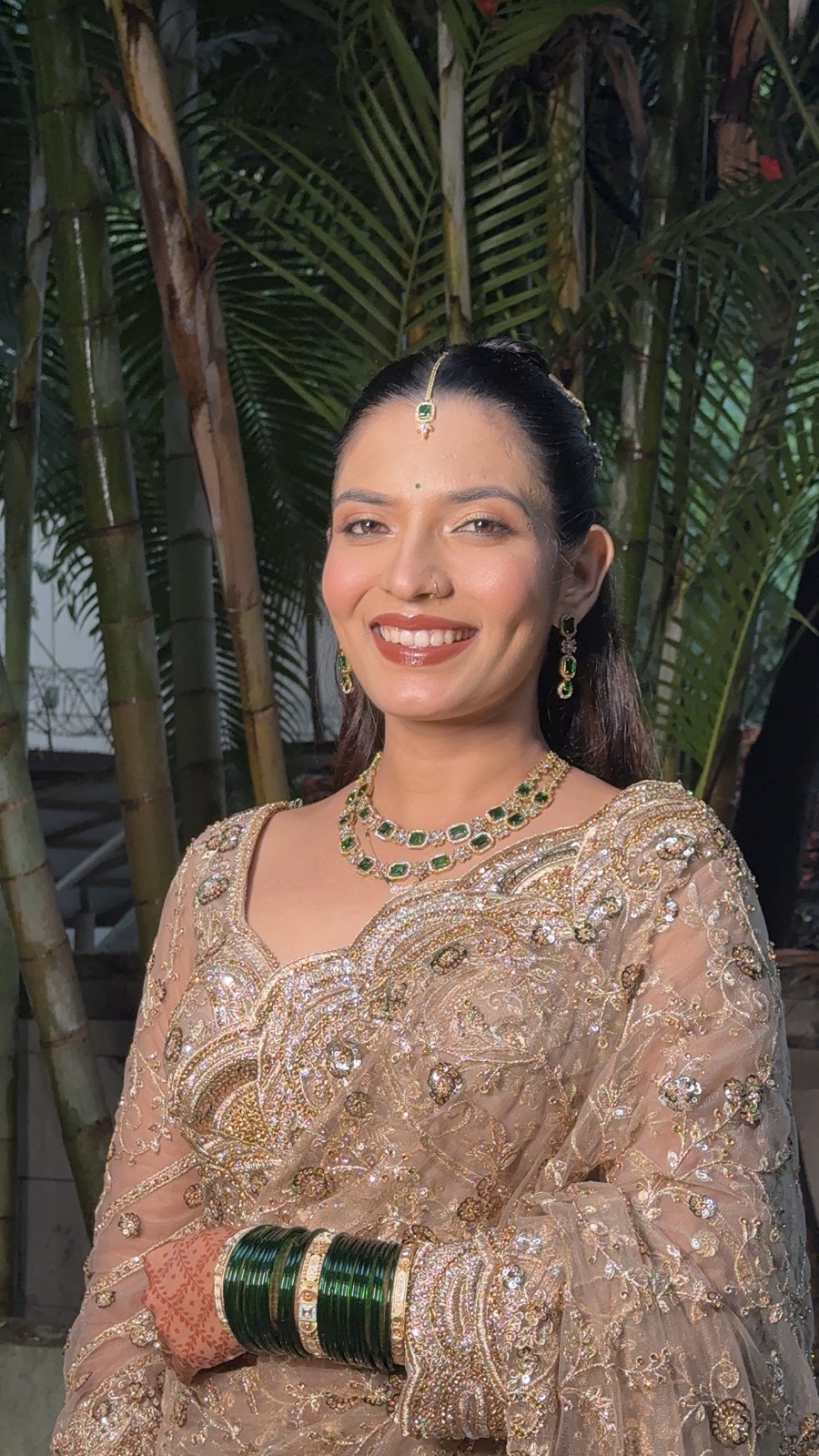 Guest look with soft glam makeup in a beige saree